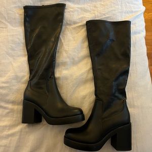 Tall black boots